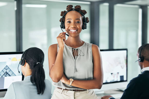 A support professional wearing a headset in an office.