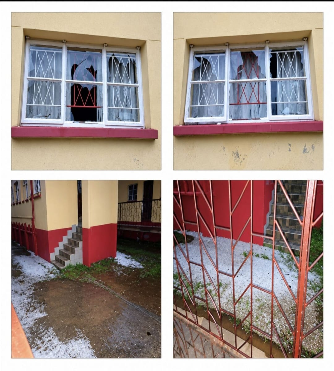 Broken windows and visible damage around a building.
